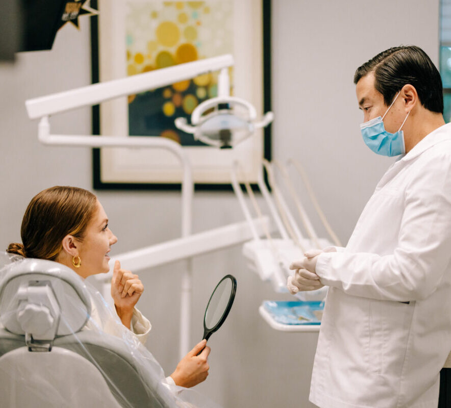 patient consults with dentist