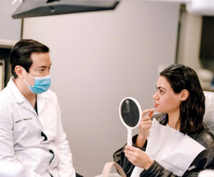 patient consulting with dentist